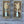 114 - 11 Antique Bottle Art - Rafter Diamond W - Painted Door on Main