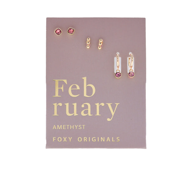 Earring set on a 'February Amethyst' card with 'Foxy Originals' branding