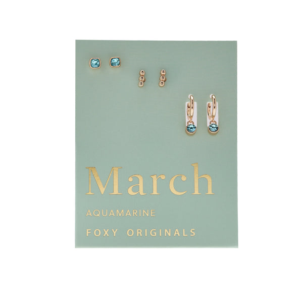 Set of earrings on a card with 'March' and 'Foxy Originals' text
